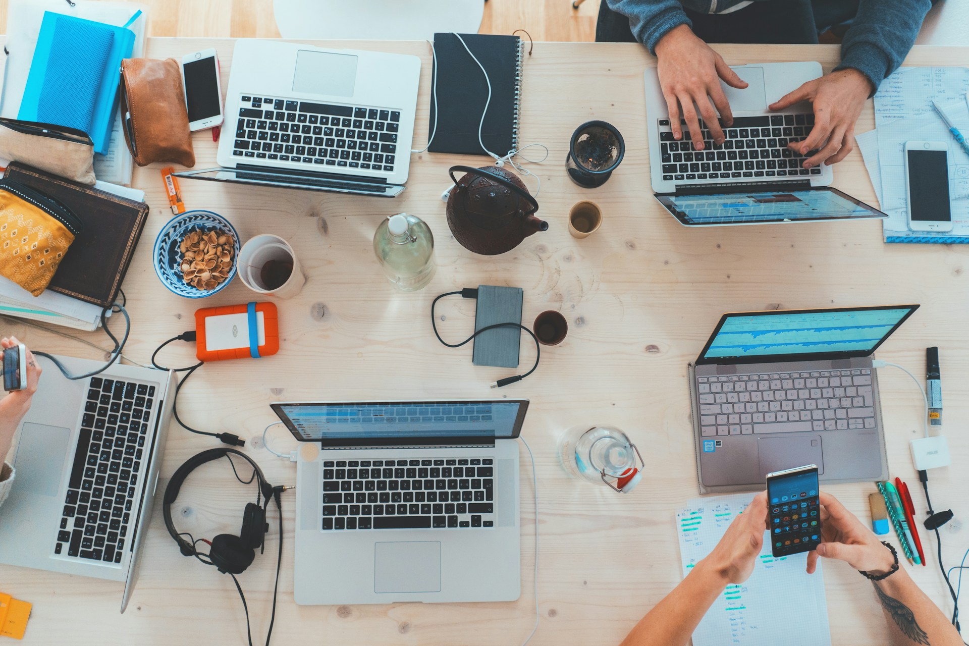 A team in a digital marketing agency in Johannesburg working together around a table.